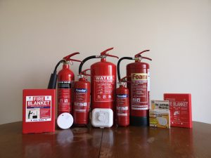 Essential fire safety equipment for the workplace: extinguishers, smoke alarms, and carbon monoxide detectors - Kirby Fire Safety.